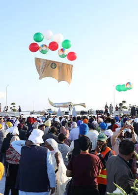 Crowd at a Prestige International outdoor ceremony